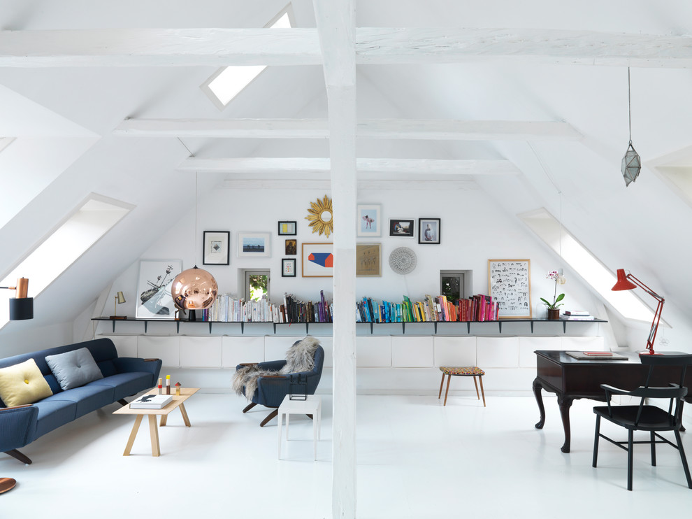 Mid-sized eclectic living room in Copenhagen with white walls and white floor.