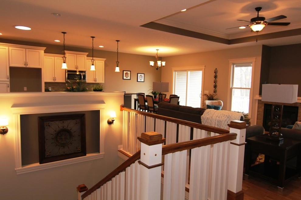 Staircase - mid-sized transitional straight staircase idea in Chicago