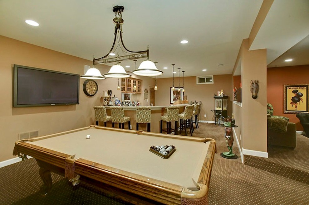 Basement - huge traditional walk-out carpeted basement idea in Baltimore with beige walls and no fireplace