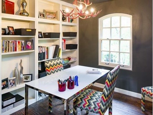 Inspiration for a large eclectic study room in Dallas with grey walls, dark hardwood floors and a freestanding desk.