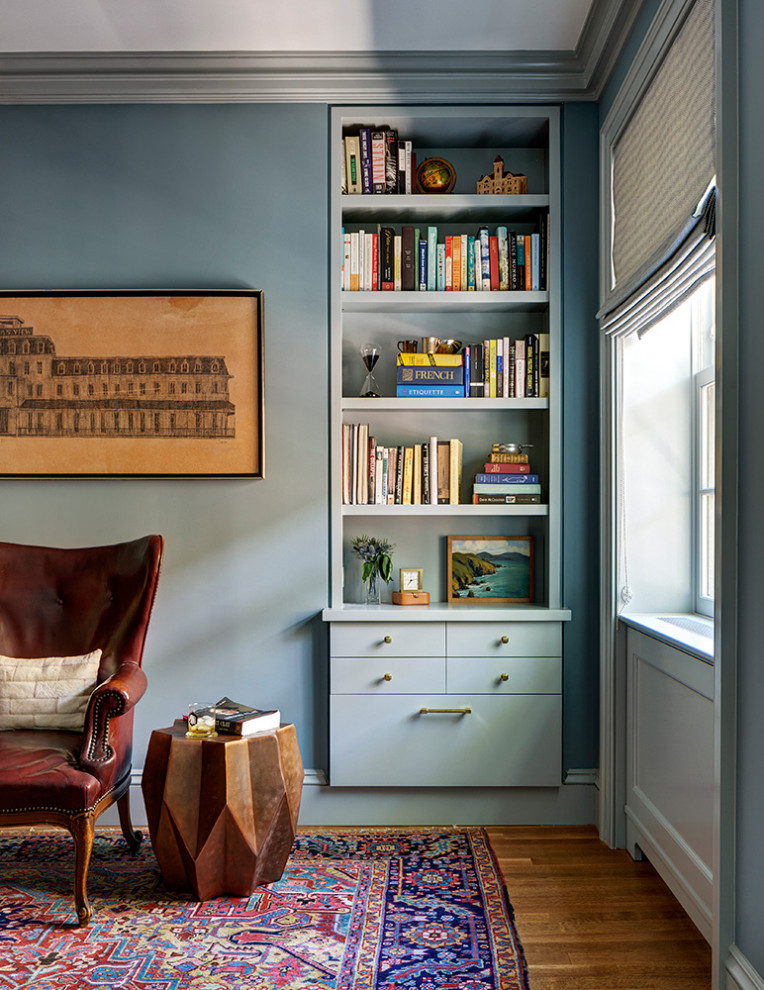 Design ideas for a mid-sized transitional home office in New York with blue walls, dark hardwood floors and multi-coloured floor.