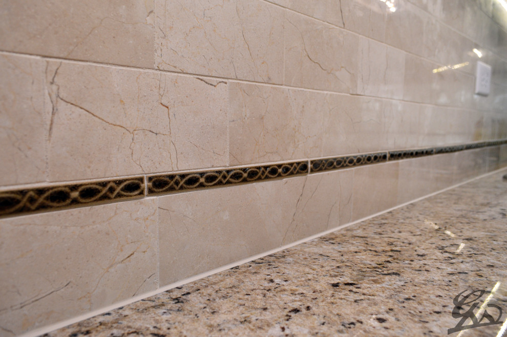 Example of a classic medium tone wood floor and brown floor kitchen design in Chicago with granite countertops, beige backsplash and subway tile backsplash