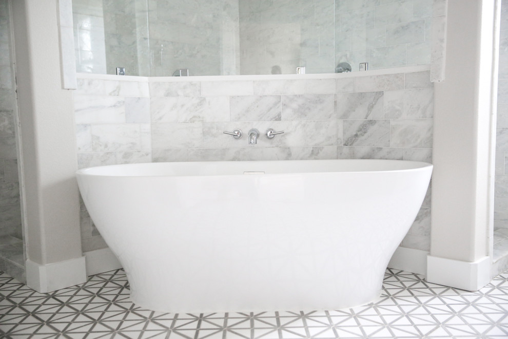 Design ideas for a traditional master bathroom in Dallas with shaker cabinets, white cabinets, a freestanding tub, a double shower, white walls, an undermount sink, solid surface benchtops, multi-coloured floor, an open shower and white benchtops.
