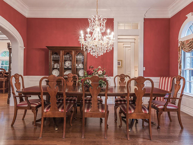 This is an example of an expansive victorian dining room in Austin.