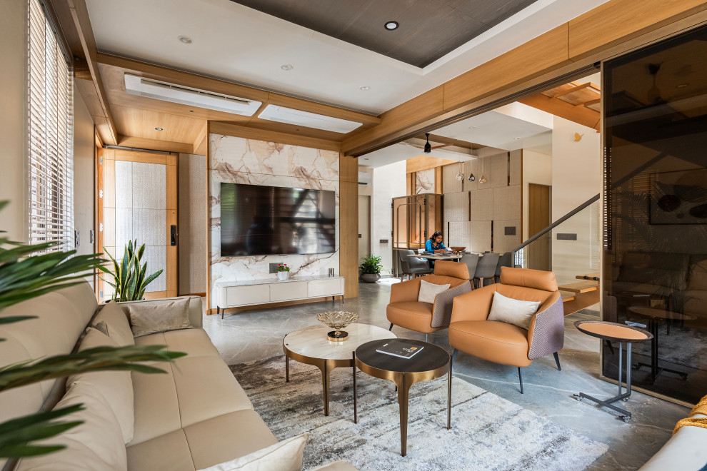 This is an example of a contemporary living room in Ahmedabad.