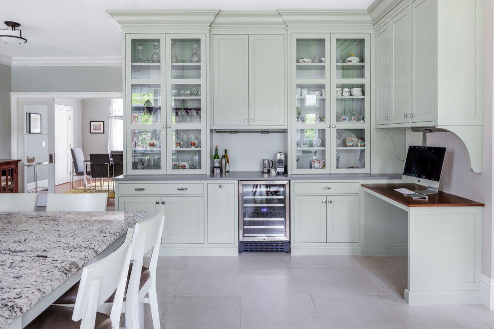 Huge transitional l-shaped ceramic tile and white floor kitchen photo in Boston with shaker cabinets, green cabinets, concrete countertops, stainless steel appliances and no island