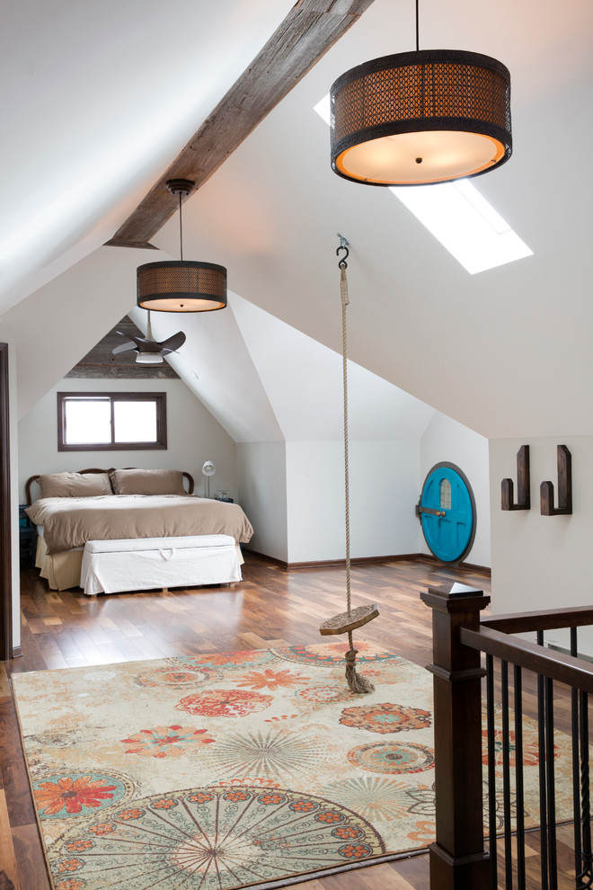 Attic master suite with a Hobbit Hole - We took this unfinished attic and turned it into a master suite full of whimsical touches. There is a round Hobbit Hole door that leads to a carpeted play room for the kids, a rope swing and 2 secret bookcases that are opened when you pull the secret Harry Potter books.