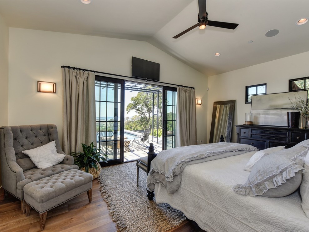 Design ideas for a transitional master bedroom in Sacramento with white walls, medium hardwood floors and no fireplace.
