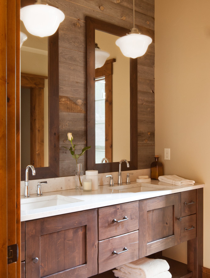 Design ideas for a mid-sized transitional kids bathroom in Denver with shaker cabinets, medium wood cabinets, beige walls, medium hardwood floors, an undermount sink, engineered quartz benchtops, brown floor and white benchtops.