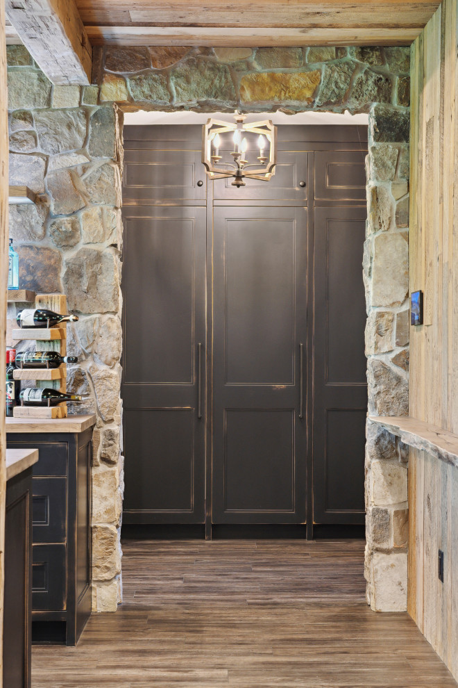 Inspiration for a rustic basement remodel in Minneapolis