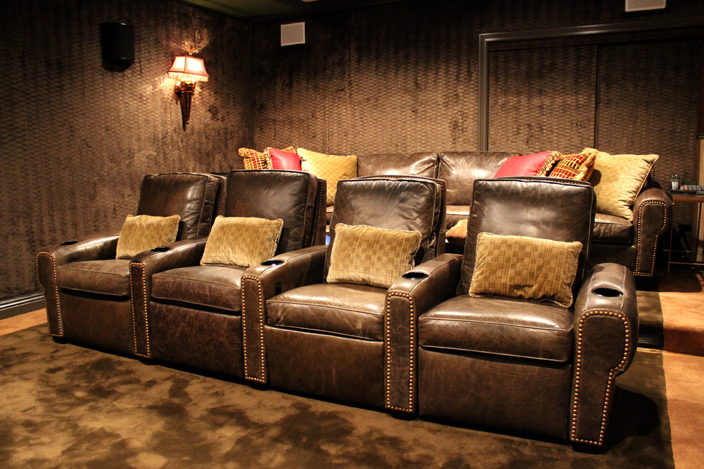 Photo of a traditional home theatre in New York with brown floor.