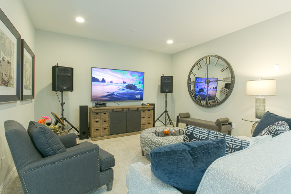 This is an example of a mid-sized transitional enclosed home theatre in Dallas with grey walls, carpet, a wall-mounted tv and grey floor.