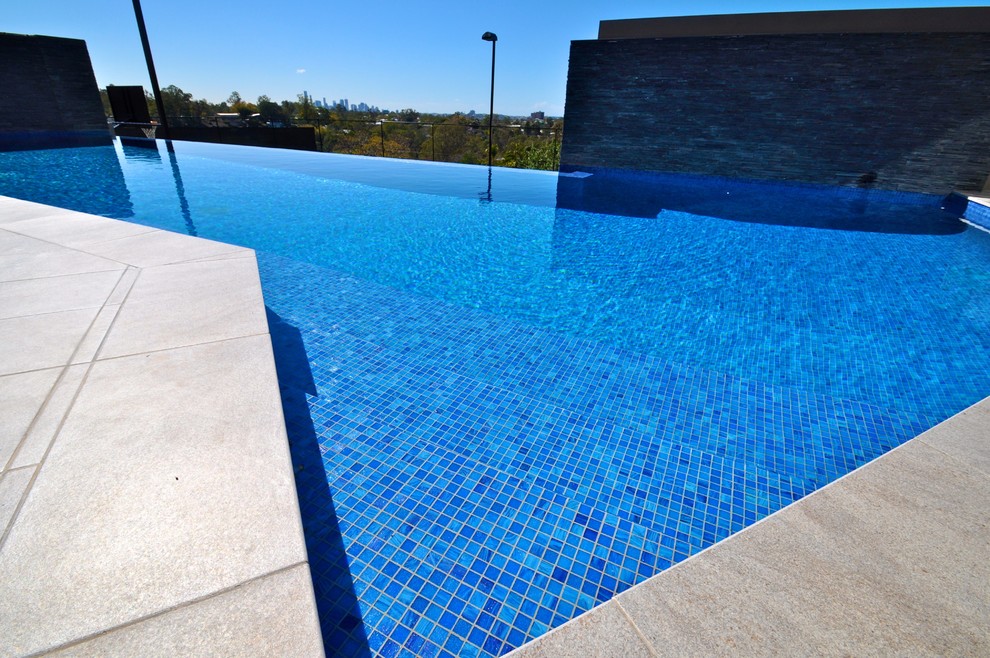 Photo of a contemporary pool in Brisbane.