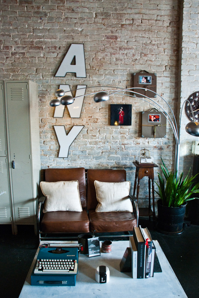 Example of a large eclectic open concept dark wood floor living room design in Houston with white walls