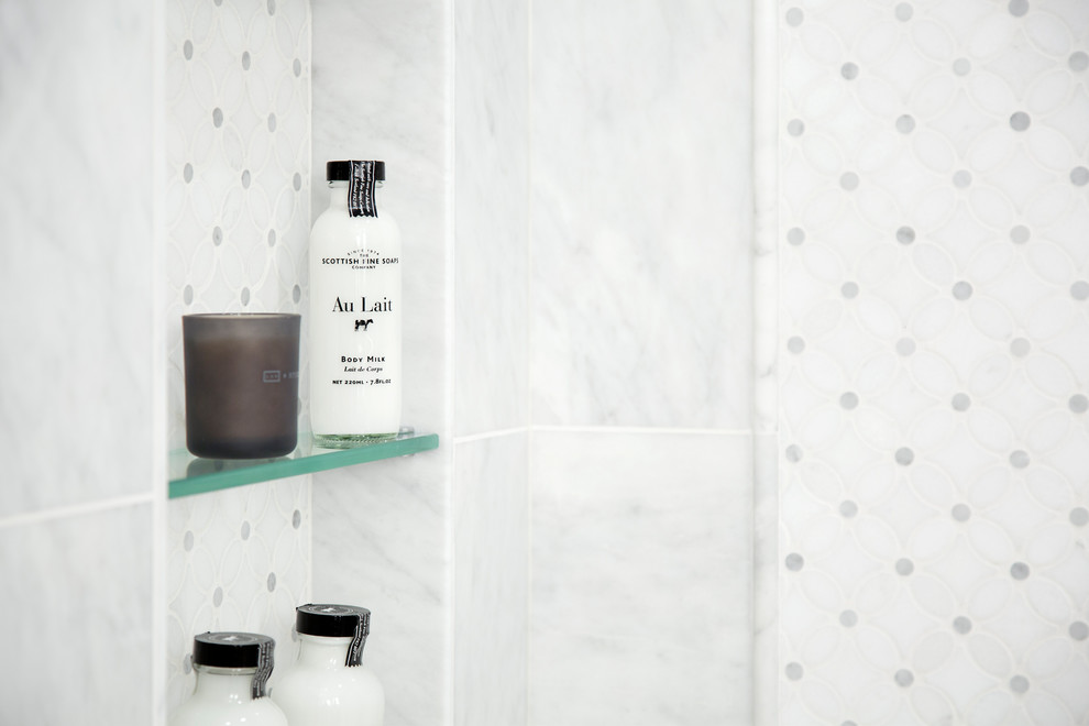 Example of a small transitional white tile and marble tile marble floor and white floor home design design in Vancouver with shaker cabinets, gray cabinets, a one-piece toilet, gray walls, an undermount sink, quartz countertops and a hinged shower door