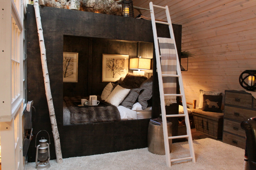 This is an example of a mid-sized country bedroom in Other with dark hardwood floors and brown floor.