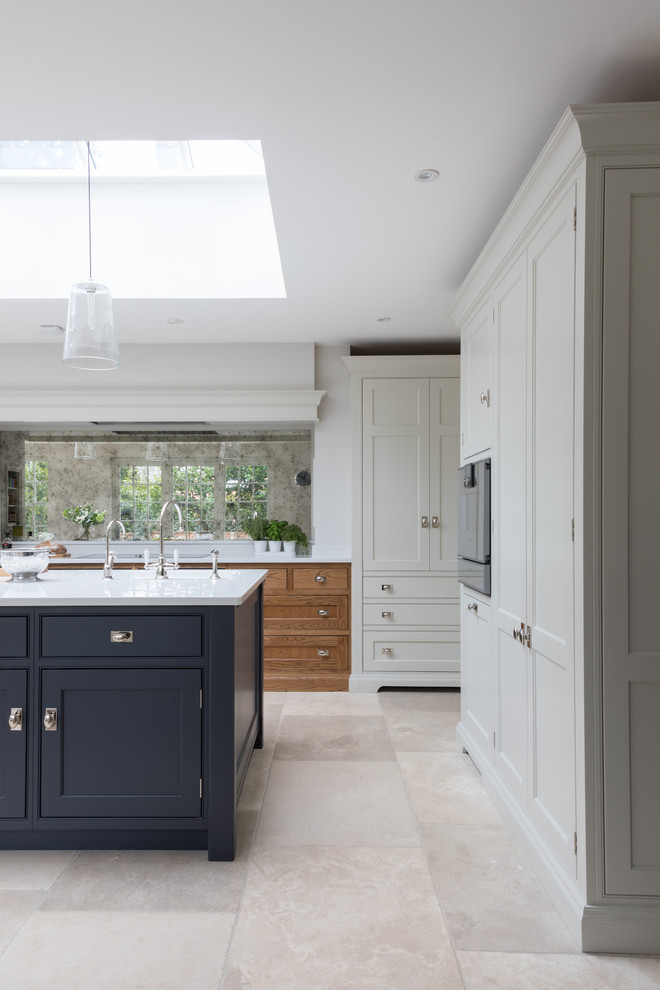 Photo of a mid-sized transitional kitchen in Surrey.