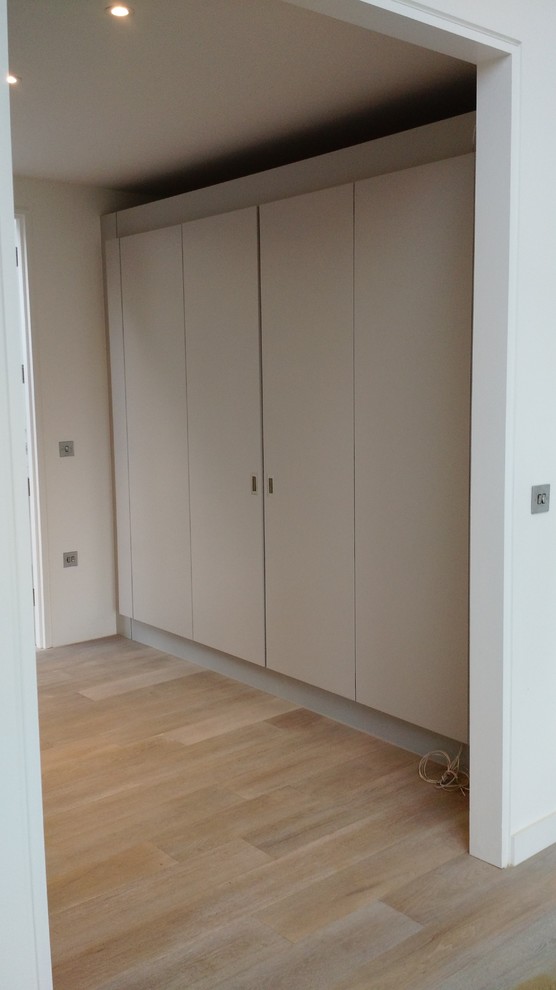 Photo of a contemporary storage and wardrobe in Wiltshire.