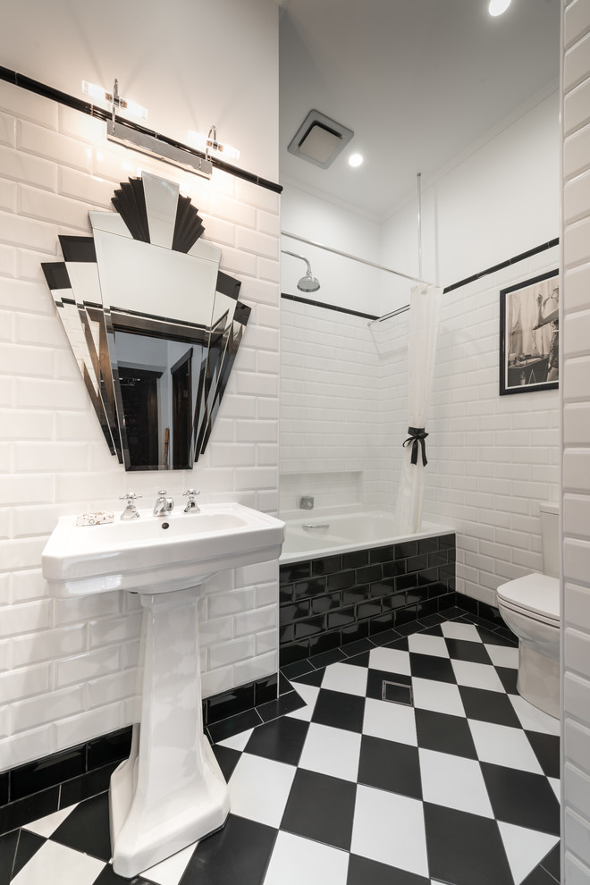 Design ideas for a small contemporary master bathroom in Other with a pedestal sink, a drop-in tub, a shower/bathtub combo, a two-piece toilet, white tile, subway tile and white walls.