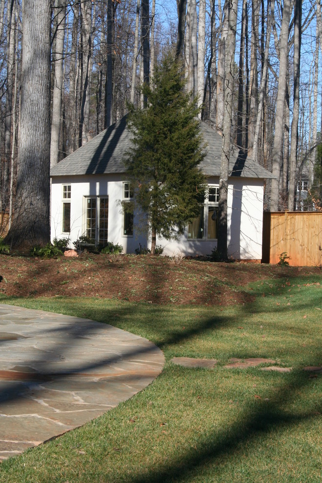 Inspiration for a mid-sized country backyard xeriscape in Raleigh with a garden path.