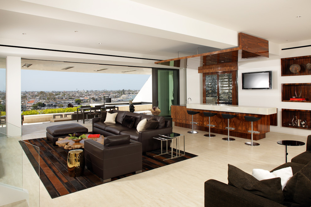 This is an example of a contemporary living room in Los Angeles with a home bar.