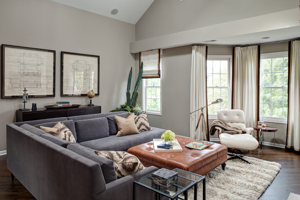 Photo of a contemporary family room in Chicago with grey walls.