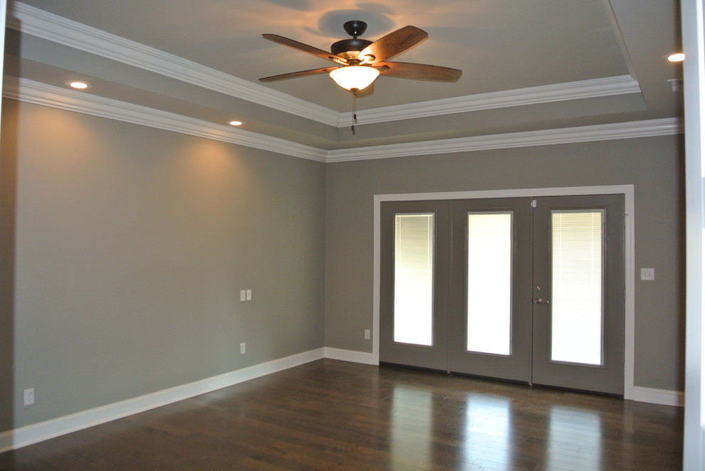 Home design - transitional medium tone wood floor home design idea with gray walls