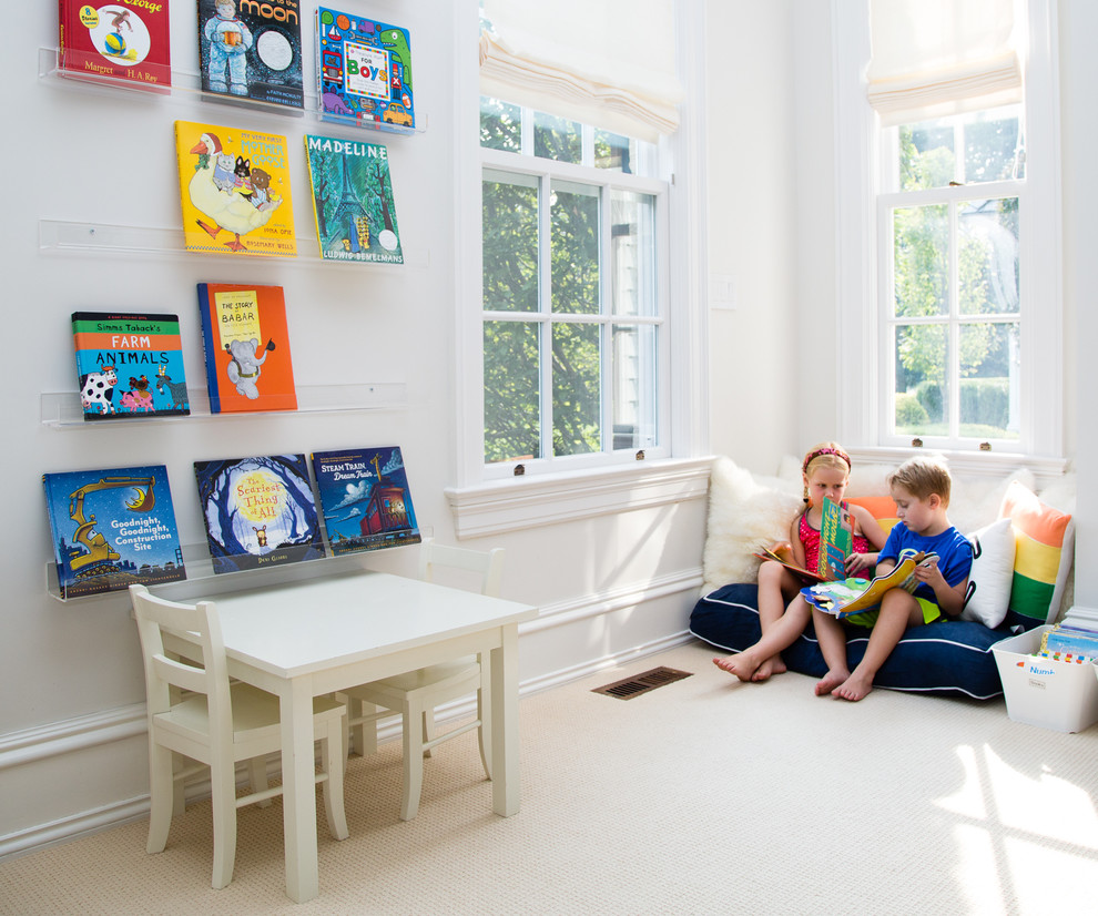 Small scandinavian gender-neutral kids' playroom in New York with white walls, carpet and beige floor for kids 4-10 years old.