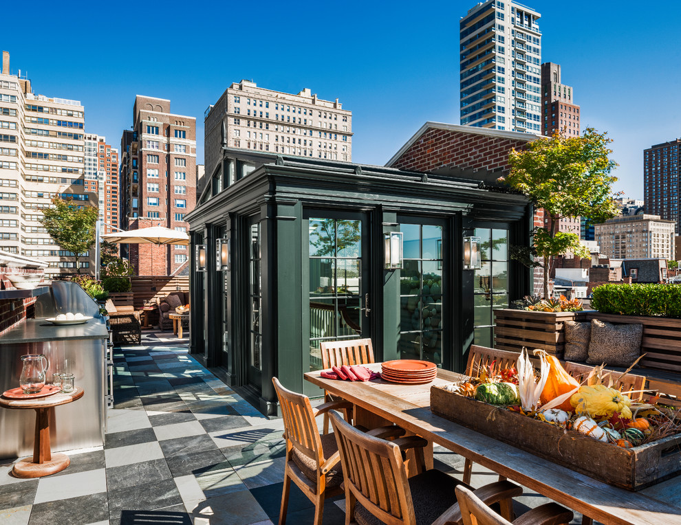 Design ideas for a large traditional rooftop and rooftop deck in Philadelphia with an outdoor kitchen.