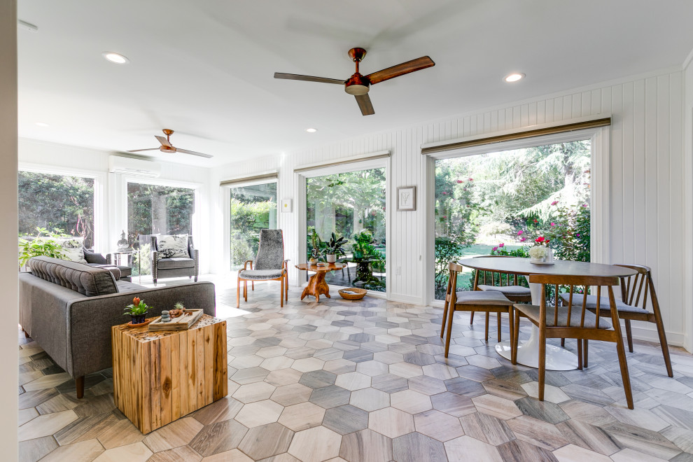 Idee per una grande veranda minimalista con pavimento con piastrelle in ceramica e pavimento beige