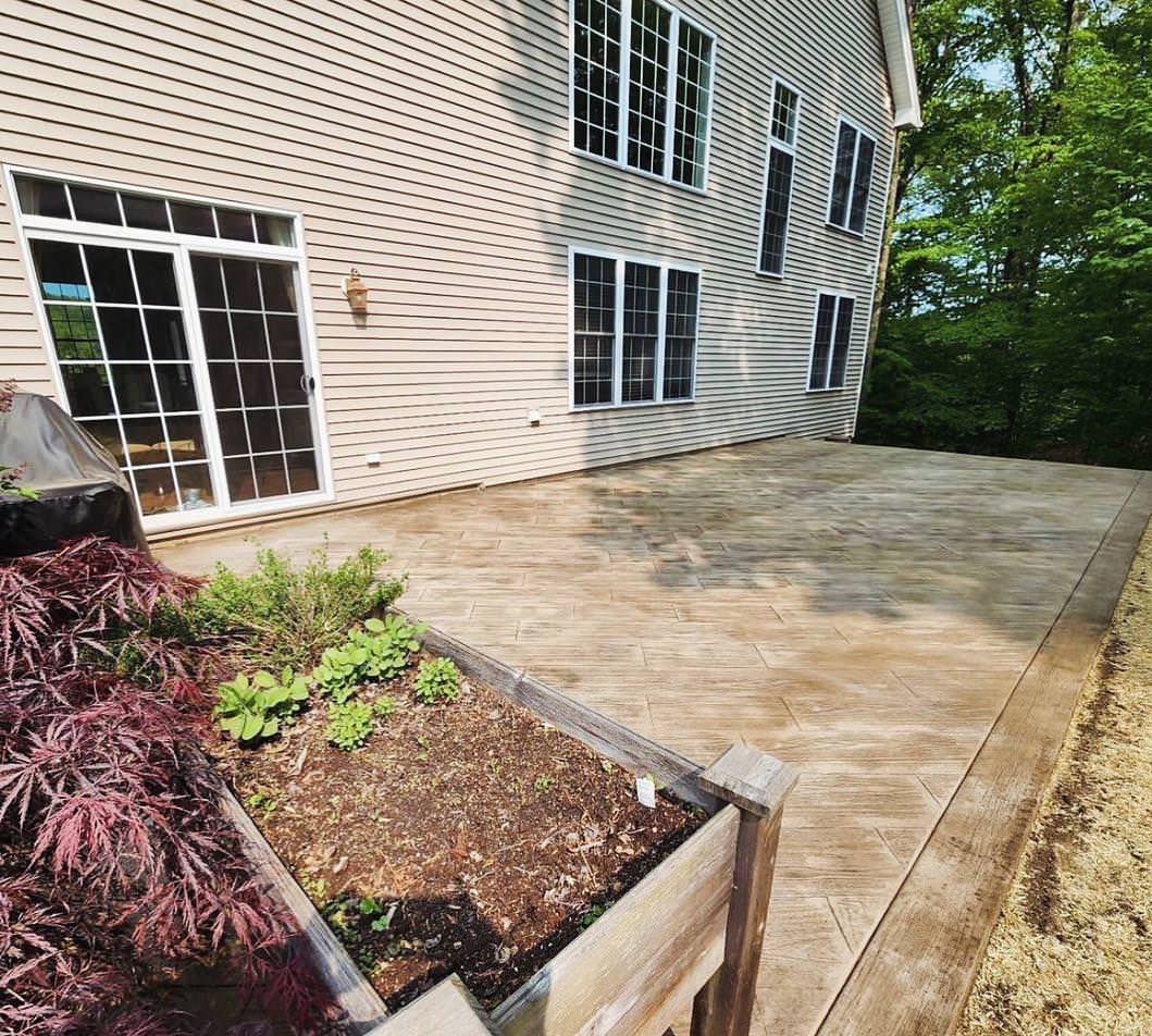Turtle creek backyard Stamped Concrete patio!