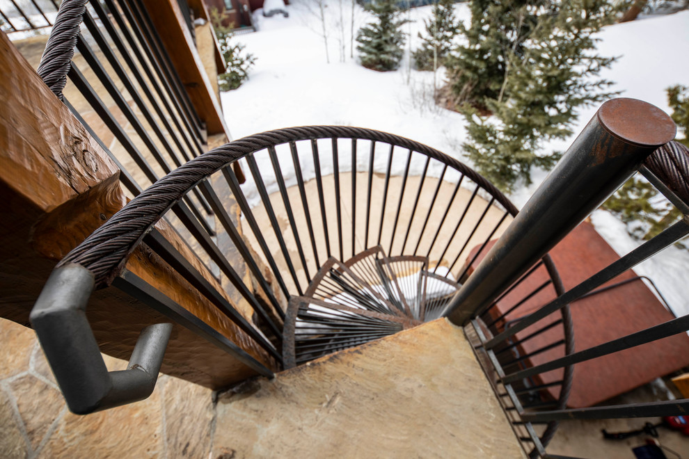 Mountain style home design photo in Denver