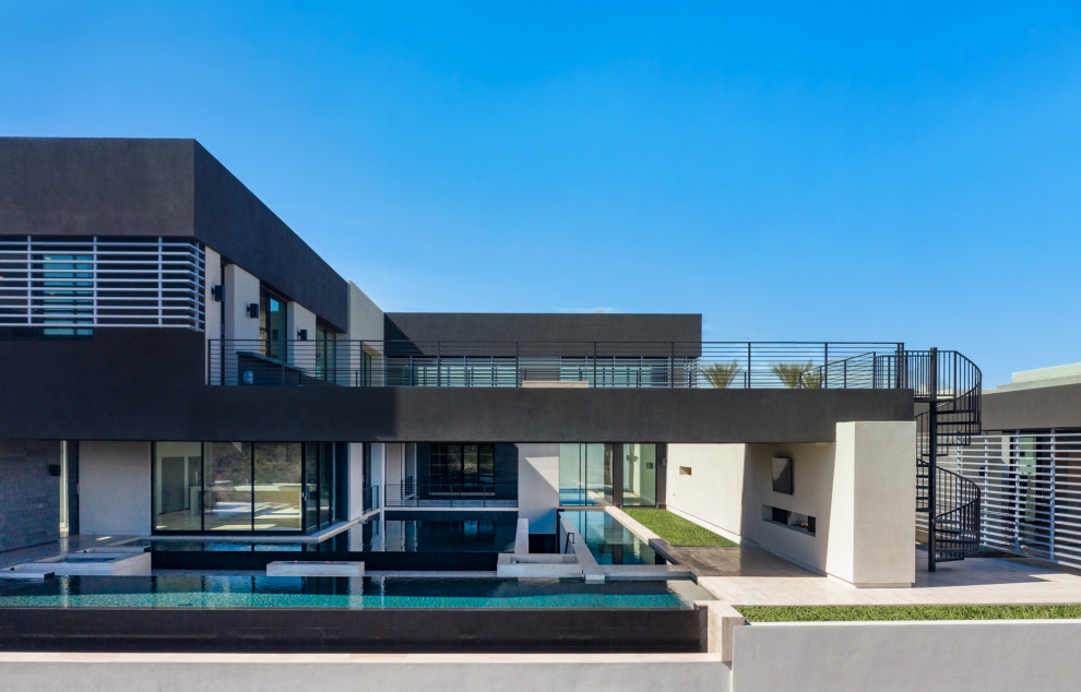 Expansive contemporary three-storey house exterior in Las Vegas.