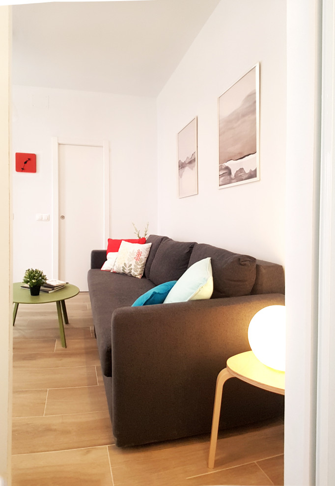 Immagine di un piccolo soggiorno design aperto con sala formale e pareti bianche