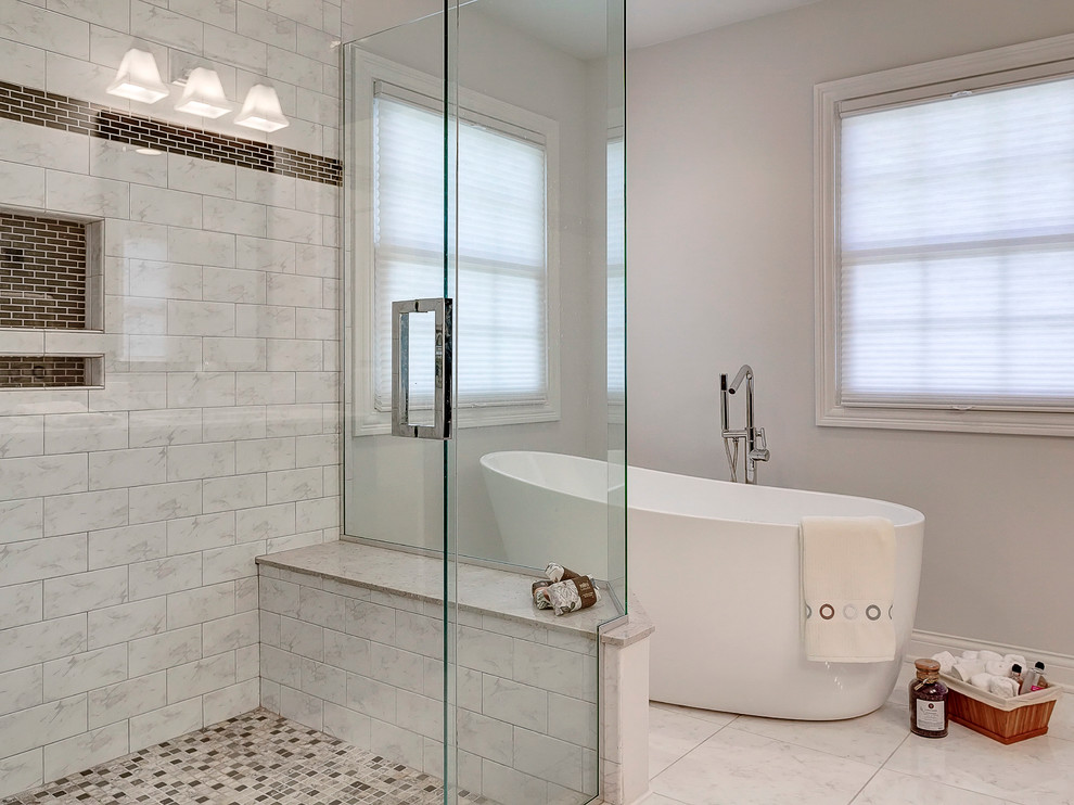 Large modern master bathroom in Los Angeles with an undermount sink, shaker cabinets, dark wood cabinets, marble benchtops, a freestanding tub, an open shower, a two-piece toilet, multi-coloured tile, ceramic tile, grey walls and porcelain floors.