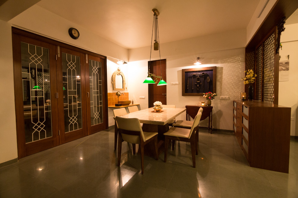 Photo of an asian dining room in Pune.