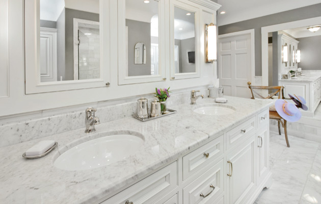 Inspiration for a mid-sized transitional master marble floor bathroom remodel with recessed-panel cabinets, white cabinets, gray walls, an undermount sink and quartzite countertops