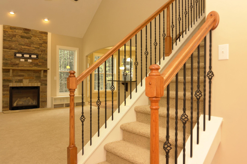 Design ideas for a mid-sized traditional staircase in Raleigh.