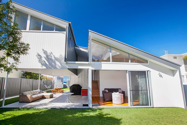 Photo of a small contemporary two-storey exterior in Sunshine Coast.