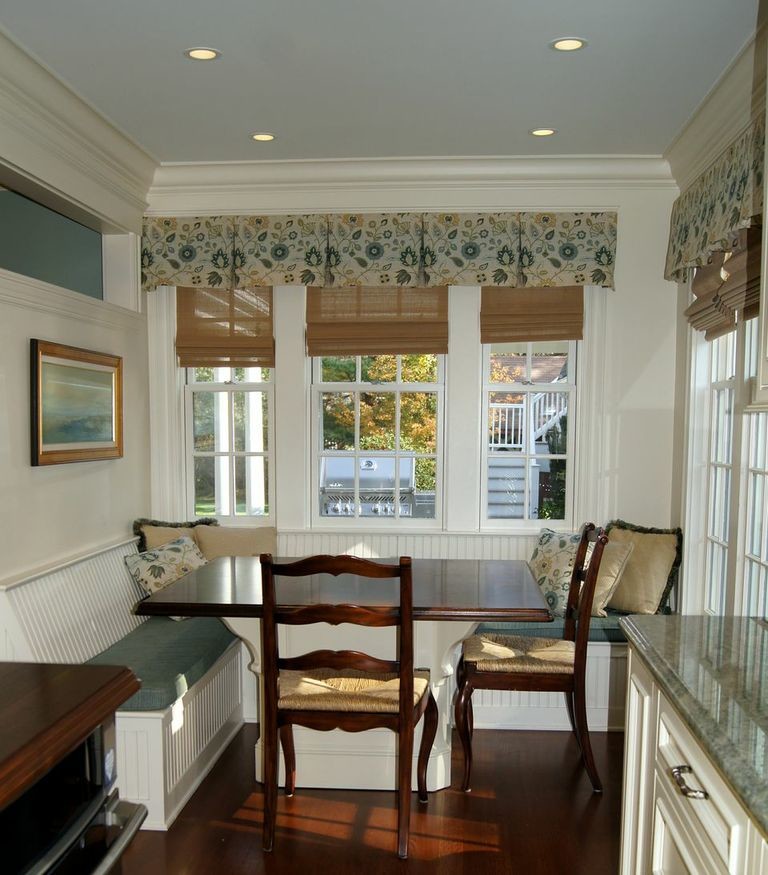 Photo of a mid-sized traditional kitchen in Boston with dark hardwood floors.