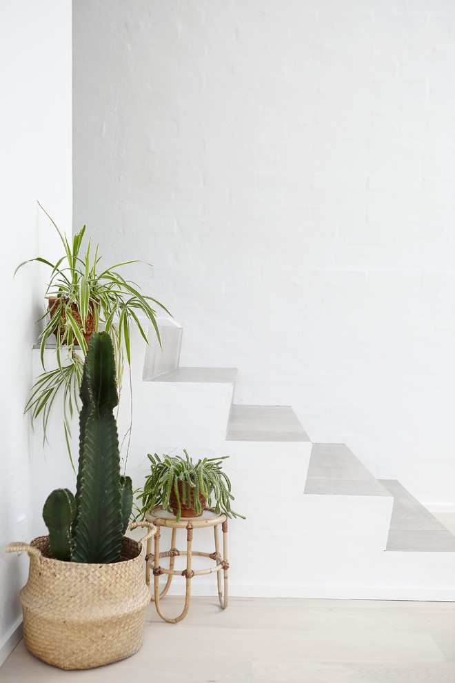 Design ideas for a scandinavian limestone staircase in Aarhus with limestone risers.