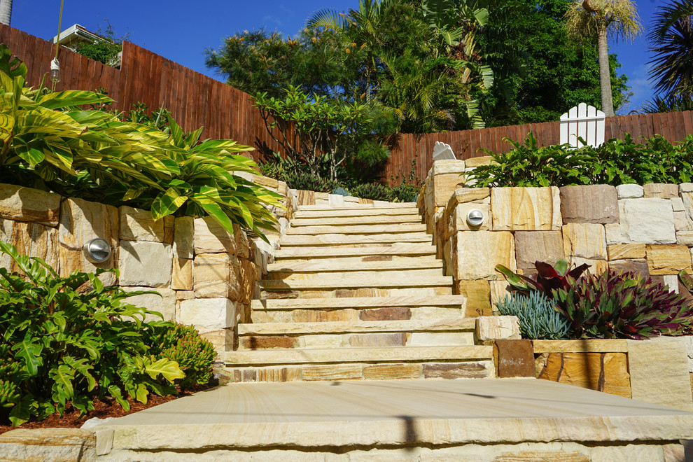 Nable Residence Sandstone stairs and retaining walls Beach Style