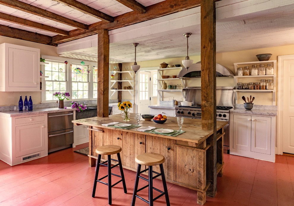 This is an example of a large country kitchen in Boston.