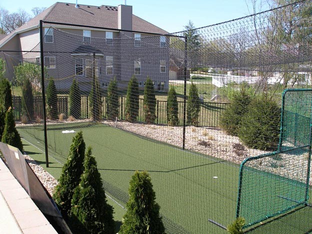Backyard Batting Cage  Traditional  Landscape  St Louis  by Sport Court St. Louis