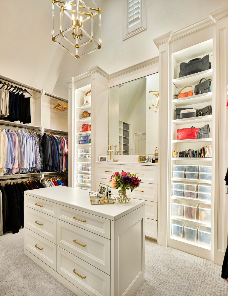 Elegant gender-neutral carpeted closet photo in Dallas