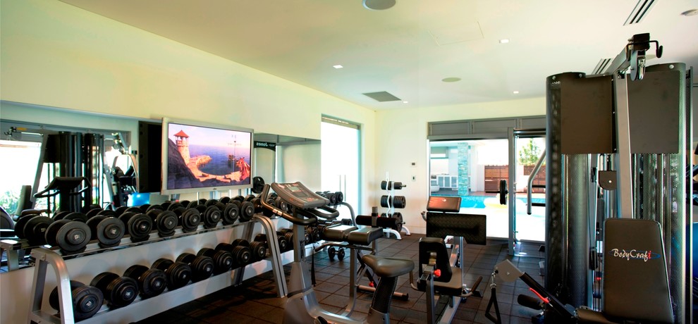 Design ideas for a large modern home weight room in Sydney with white walls.