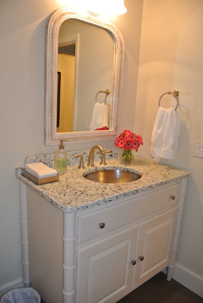 This is an example of a beach style powder room in Miami.