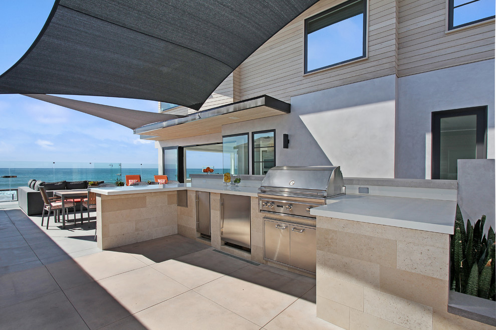 This is an example of a beach style home design in Orange County.