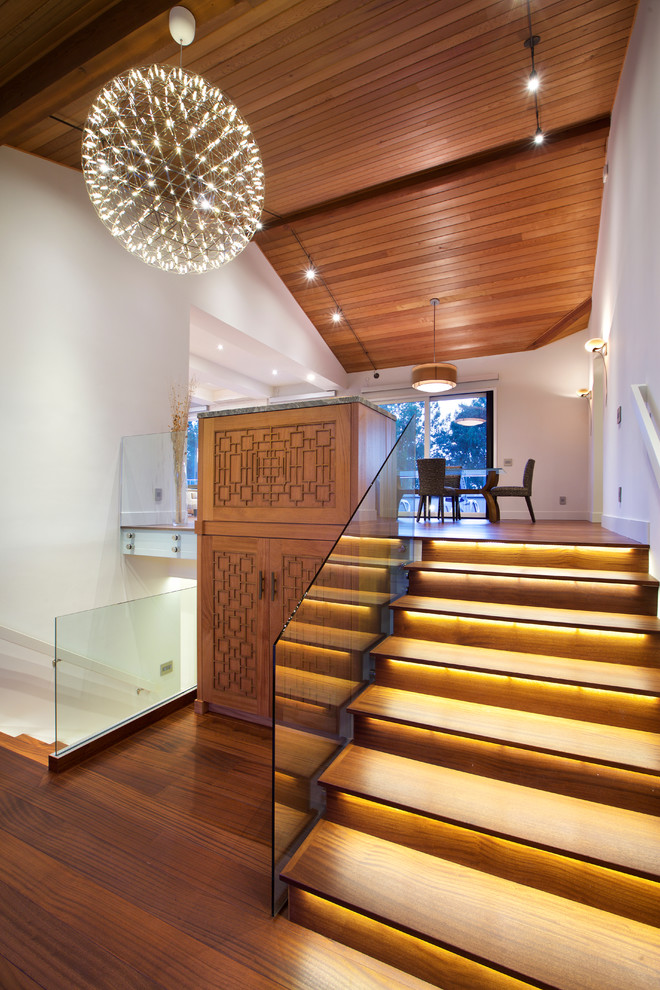 Design ideas for a small contemporary wood straight staircase in San Diego with wood risers.