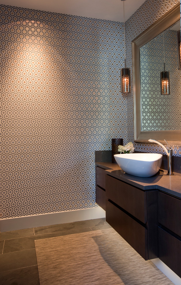Inspiration for a mid-sized modern 3/4 black tile slate floor bathroom remodel in Vancouver with a vessel sink, flat-panel cabinets, dark wood cabinets, quartz countertops, a two-piece toilet and gray walls